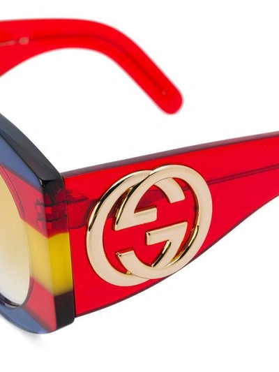 Shop Gucci Striped Round Sunglasses