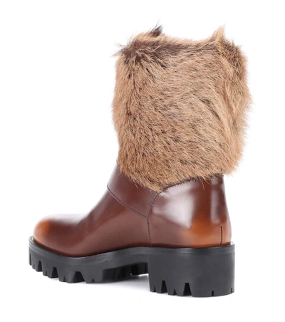 Shop Prada Fur-trimmed Leather Boots In Brown