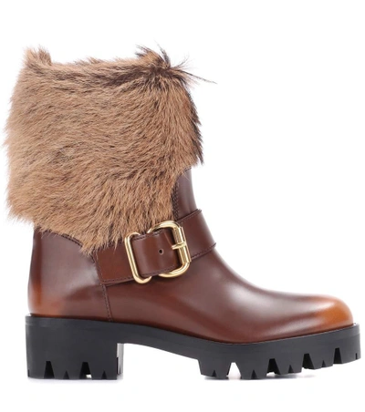 Shop Prada Fur-trimmed Leather Boots In Brown