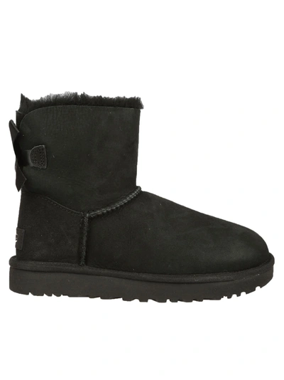 Shop Ugg Mini Balley Bow Boots In Black