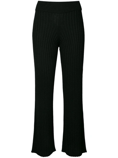 Shop Roberto Collina Flared Ribbed Trousers