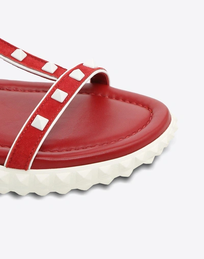 Shop Valentino Free Rockstud Flat Sandal In Red