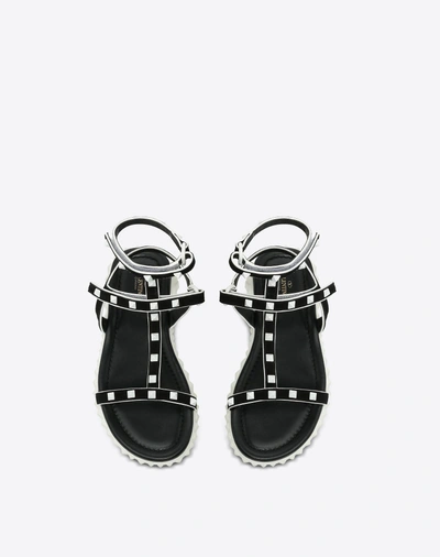 Shop Valentino Free Rockstud Flat Sandal In Black