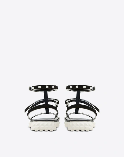 Shop Valentino Free Rockstud Flat Sandal In Black