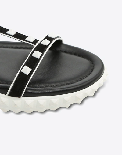 Shop Valentino Free Rockstud Flat Sandal In Black