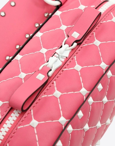 Shop Valentino Free Rockstud Spike Camera Bag In Bright Pink