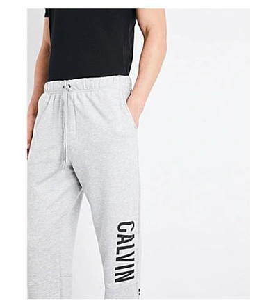 Shop Calvin Klein Logo-print Cotton-blend Track Pants In Lt Grey