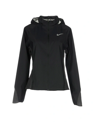 Shop Nike Jackets In Black