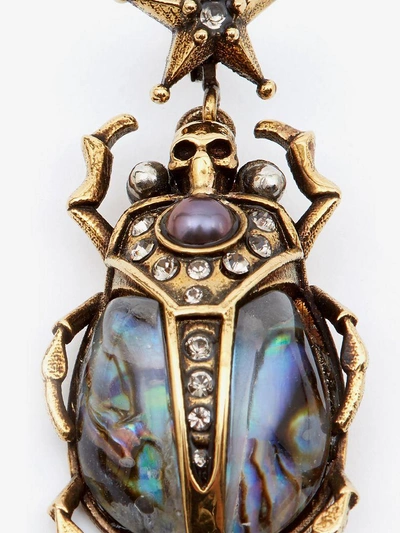 Shop Alexander Mcqueen Beetle Earrings In Antique Gold