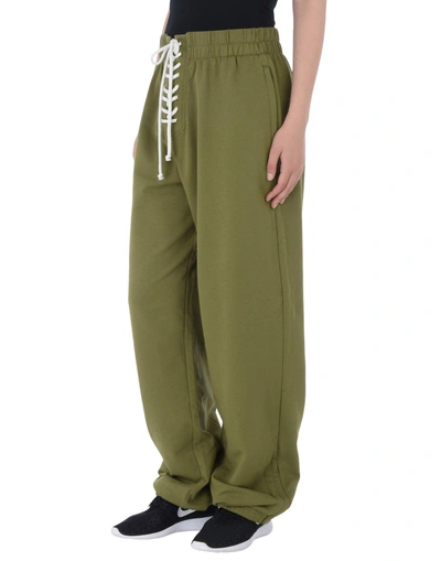 Shop Fenty X Puma Casual Pants In Military Green