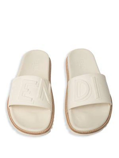 Shop Fendi Men's Logo Embossed Slide Sandals In Black