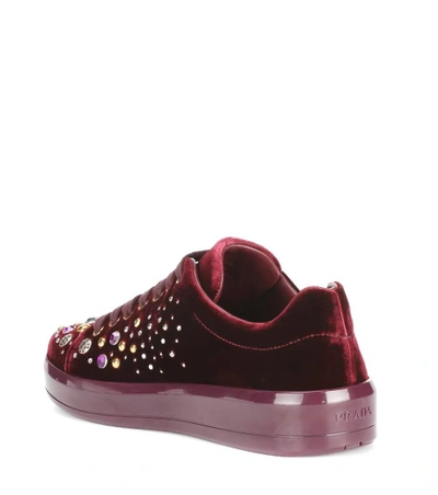 Shop Prada Embellished Velvet Sneakers In Red