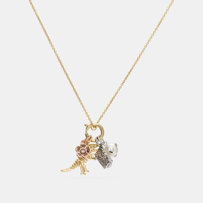Shop Coach Rexy Charm Collectible Necklace Set - Women's In Gold/silver
