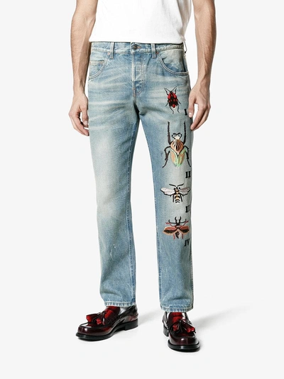 Shop Gucci Tapered Jeans With Insect Embroidery In Blue