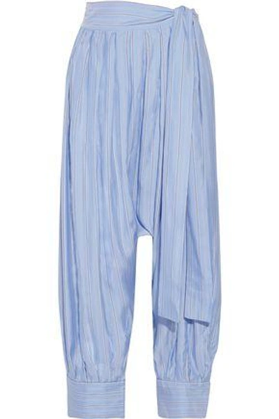 Shop Jw Anderson Woman Pleated Striped Silk-satin Twill Tapered Pants Blue