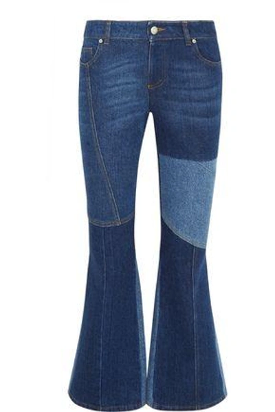 Shop Alexander Mcqueen Patchwork Cropped Mid-rise Flared Jeans In Mid Denim