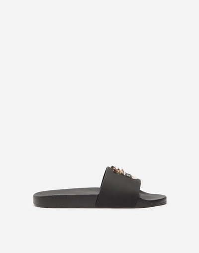 Shop Dolce & Gabbana Leather Sandals With Patch In Black
