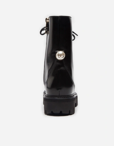 Shop Dolce & Gabbana Leather Biker Boots With Appliqué In Black