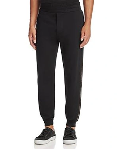 Shop Versace Gold Piping Track Pants In Black