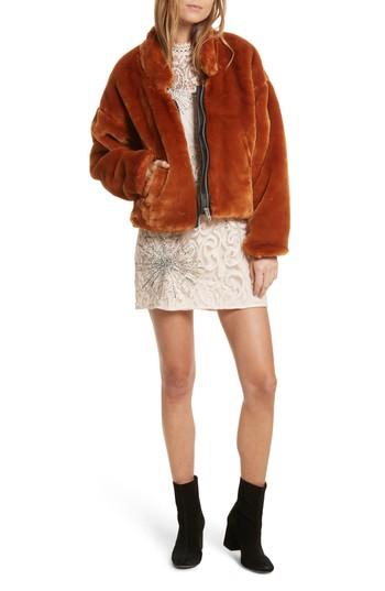 burnt orange fur coat