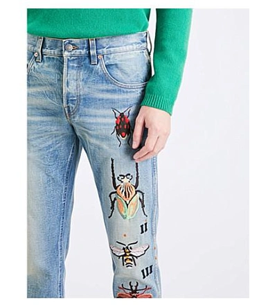 Shop Gucci Insect-embroidered Regular-fit Straight Jeans In Blue