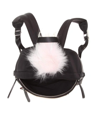 Shop Fendi Fur-trimmed Backpack In Black