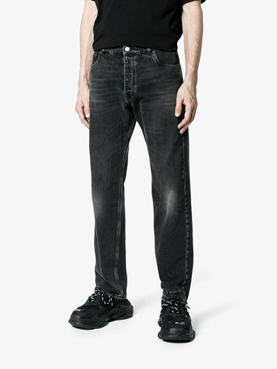 Shop Balenciaga Bal Destroyed Hem 5 Pocket Jeans In Black