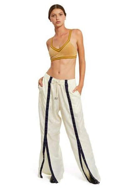 Shop Fenty X Puma Opening Ceremony Front Tearaway Track Pants In Vanilla Ice