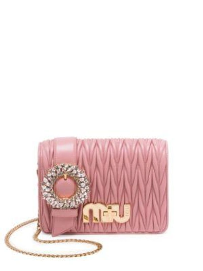 Shop Miu Miu Leather Mini Crossbody Bag In Orchidea