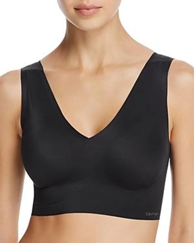 Shop Calvin Klein Comfort Seamless V-neck Wireless Bra In Black