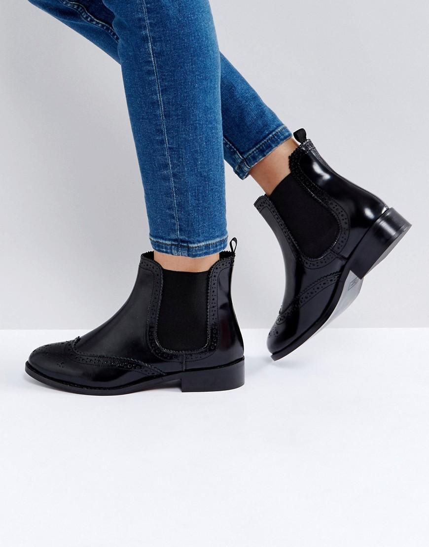 knee high black leather heeled boots
