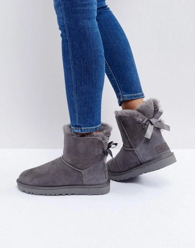 Shop Ugg Mini Bailey Bow Ii Gray Boots - Gray