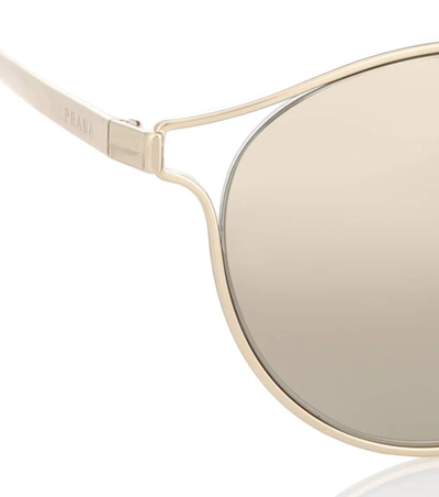 Shop Prada Round Sunglasses In Gold