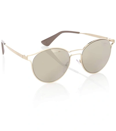 Shop Prada Round Sunglasses In Gold