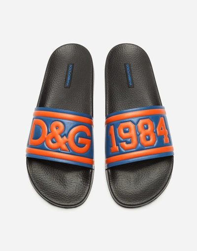 Shop Dolce & Gabbana Slippers In Printed Rubber And Calfskin In Cobalt/orange/black