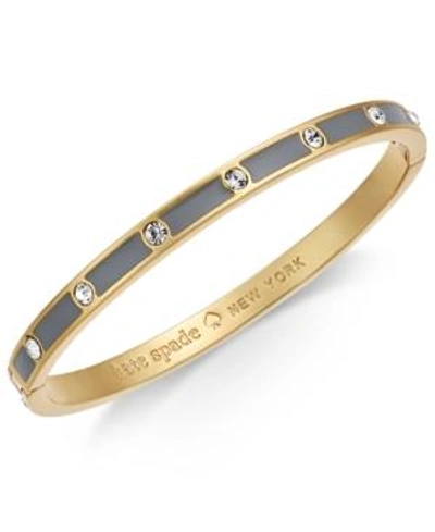 Shop Kate Spade New York Gold-tone Crystal Enamel Hinged Bangle Bracelet In Clear/grey