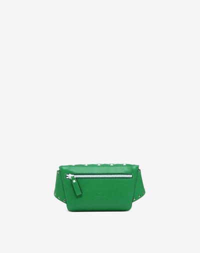 Shop Valentino Free Rockstud Spike Belt Bag In Green