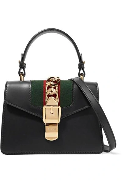 Shop Gucci Sylvie Mini Chain-trimmed Leather And Canvas Shoulder Bag In Black