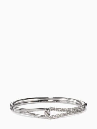 Shop Kate Spade Get Connected Pave Loop Bangle In Clear/silver