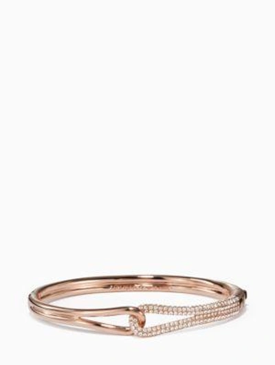 Shop Kate Spade Get Connected Pave Loop Bangle In Clear/rose Gold