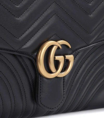 GG Marmont凸纹皮革手拿包