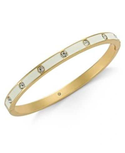 Shop Kate Spade New York Gold-tone Crystal Enamel Hinged Bangle Bracelet In White