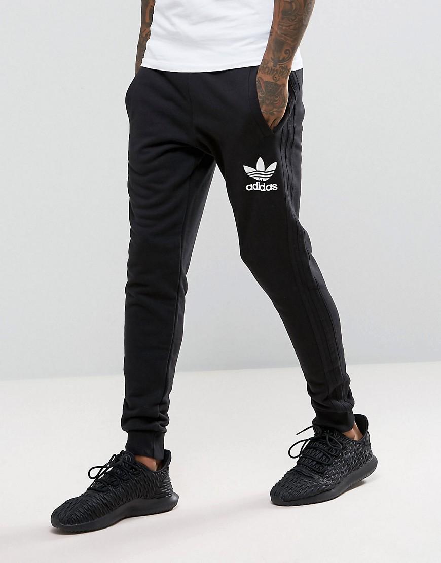 black on black adidas joggers