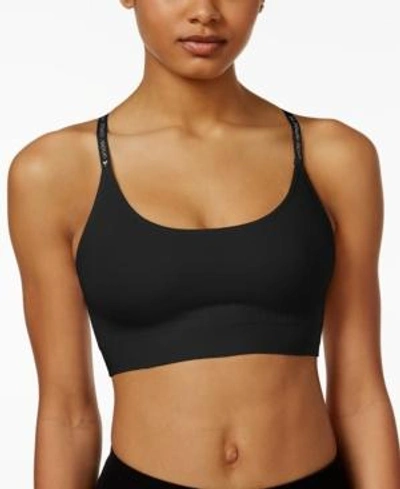 Shop Under Armour Seamless Low-impact Compression Sports Bra In Black