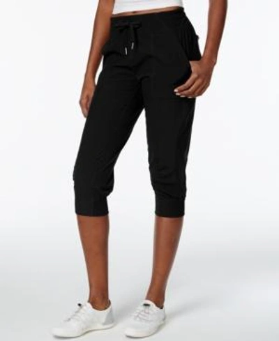 Shop Calvin Klein Performance Commuter Active Strech Woven Capri Pants In Black