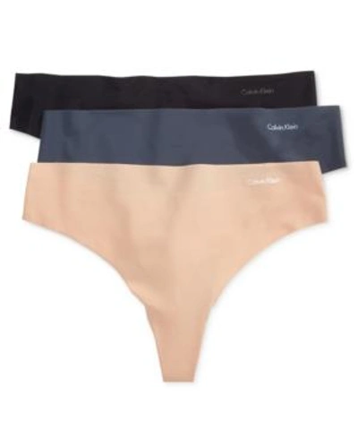Shop Calvin Klein Women's Invisibles 3-pack Thong Underwear Qd3558 In Speak Easy/light Caramel/black