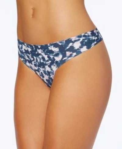 Shop Calvin Klein Invisibles Thong D3428 In Mesmerizing Print