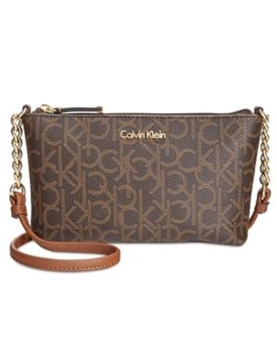 Shop Calvin Klein Hayden Signature Chain Strap Crossbody In Brown Khaki Luggage