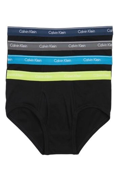 Shop Calvin Klein 4-pack Cotton Briefs In Black/ Rebel/ Blue Jay/ Grey