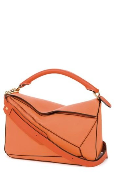 Shop Loewe Puzzle Calfskin Leather Bag - Orange In Apricot/ Orange